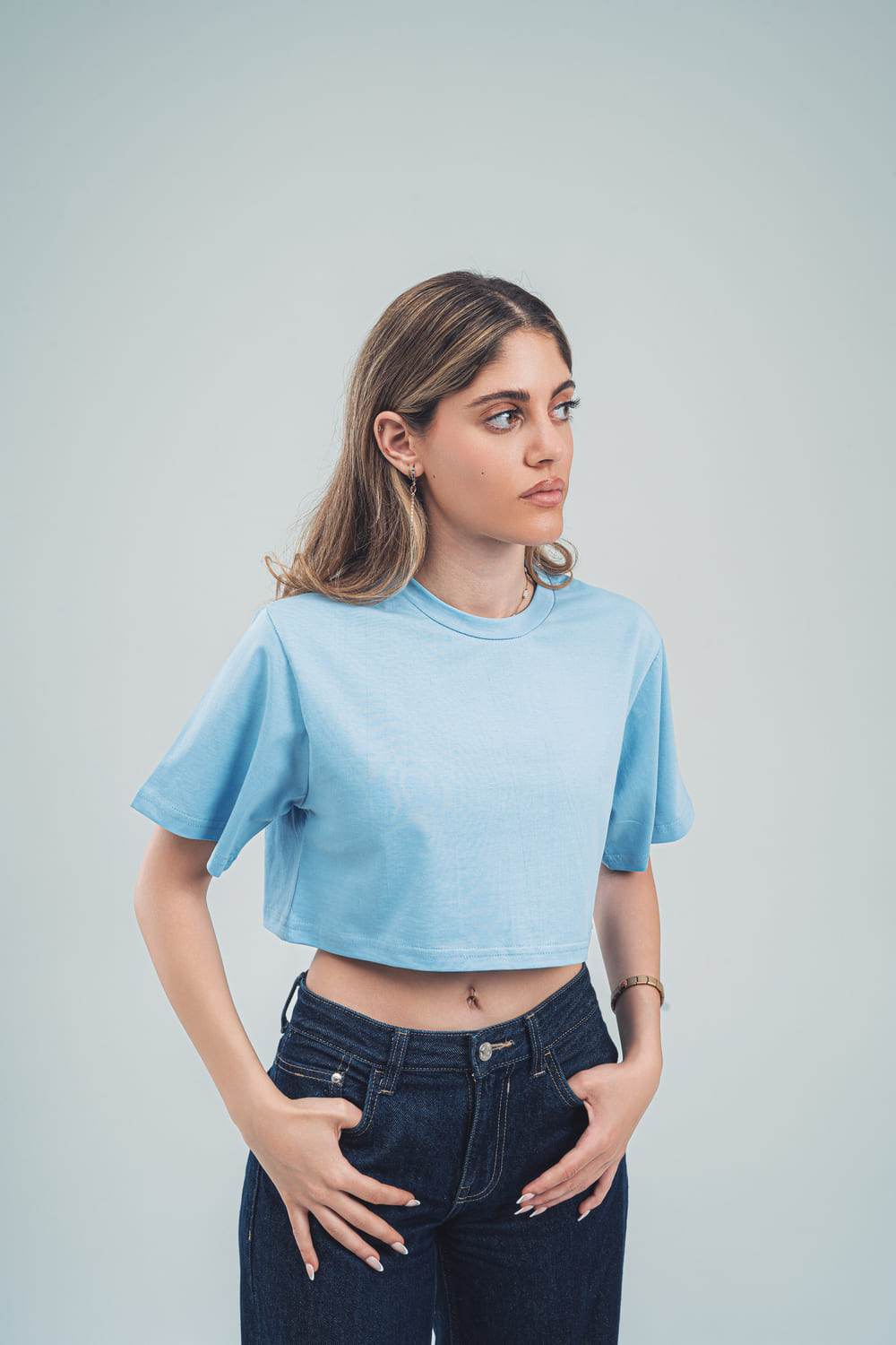 Fair & Square basic crop top for women in light blue worn with dark jeans